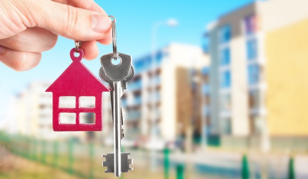 Handing keys in the house background Handing keys in the house background